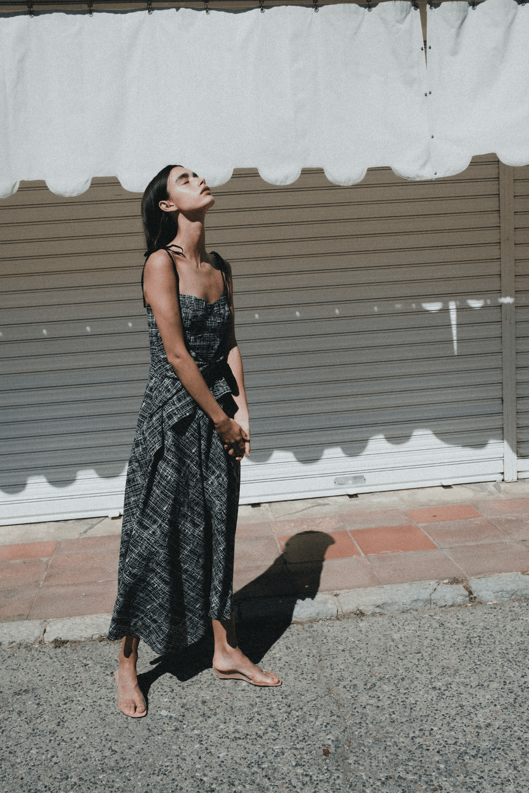 LEYA - ASYMMETRIC CUT FRONT TIED LONG DRESS - CROSSED LINES BLACK